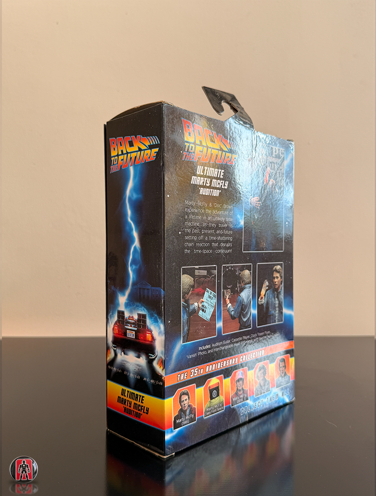 Figura de acción definitiva de NECA: Marty McFly con guitarra de la película Regreso al Futuro II