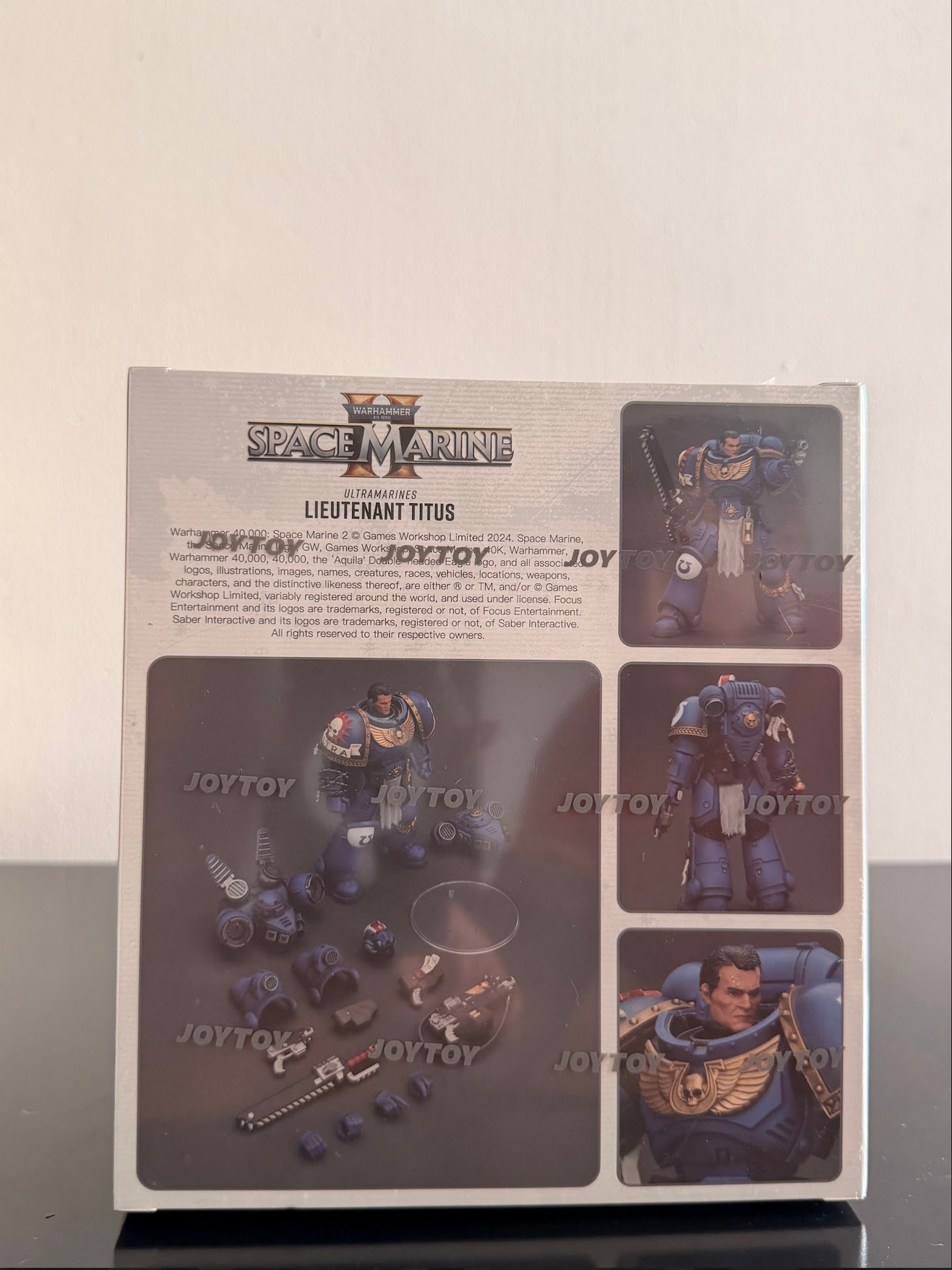 Warhammer 40,000: Space Marine 2 Ultramarines Teniente Titus Figura de acción escala 1/18