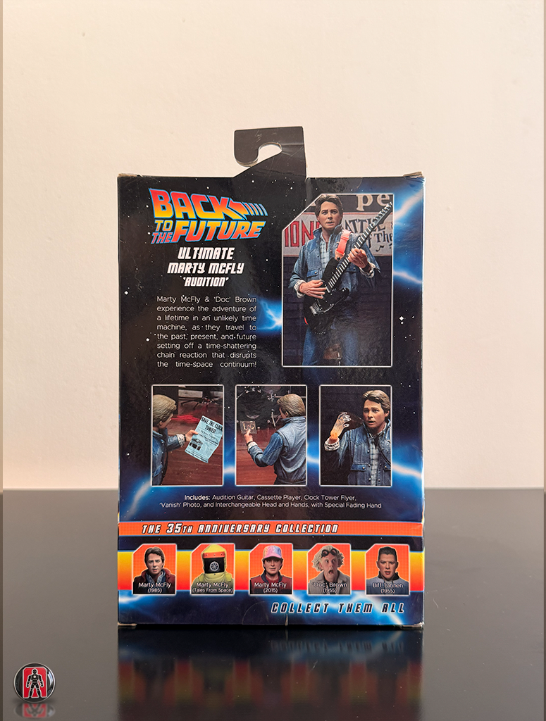 Figura de acción definitiva de NECA: Marty McFly con guitarra de la película Regreso al Futuro II