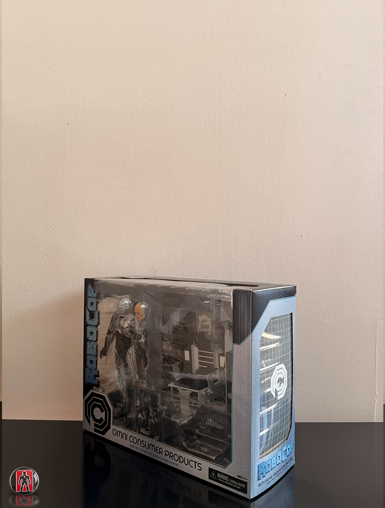 NECA Robocop Ultimate con Daños de Batalla y Silla 18cm